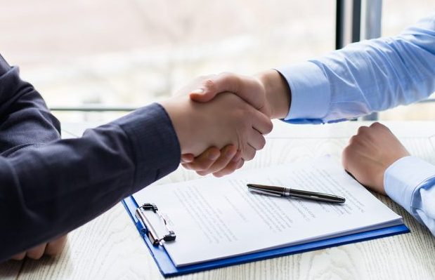 cropped-Hand-Shake-700x619-1.jpg